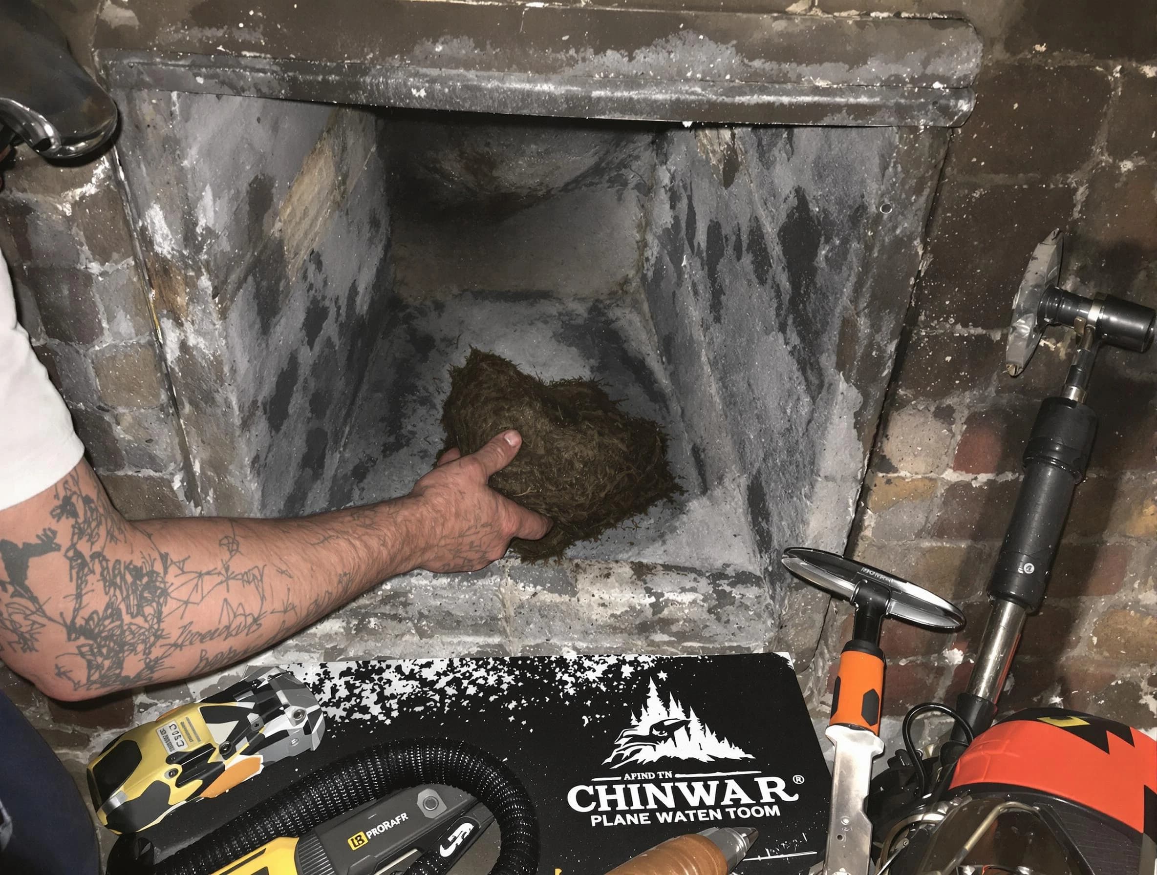 Edmond Chimney Sweep safely removing debris and screening chimney in Edmond, OK
